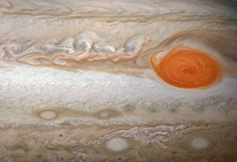 Jupiter: mission unveils the depth and structure of planet's shrinking red spot and colourful bands