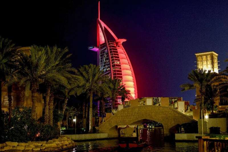 Landmarks across the UAE have been lit up in red at night and government accounts emblazoned with the #ArabstoMars hashtag