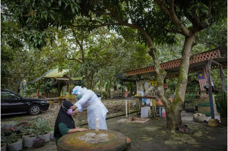 Malaysia shuts vaccination center after 204 staff infected