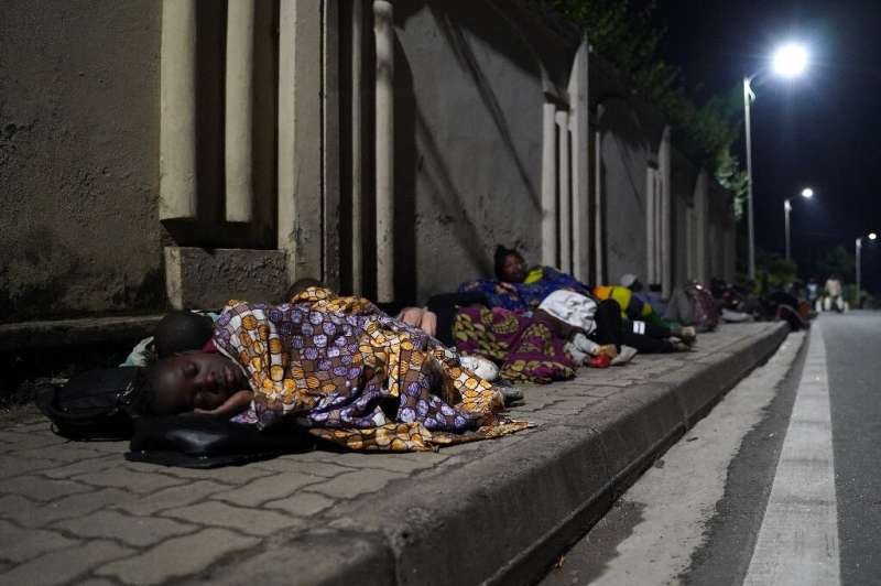 Many families slept on pavements surrounded by their belongings