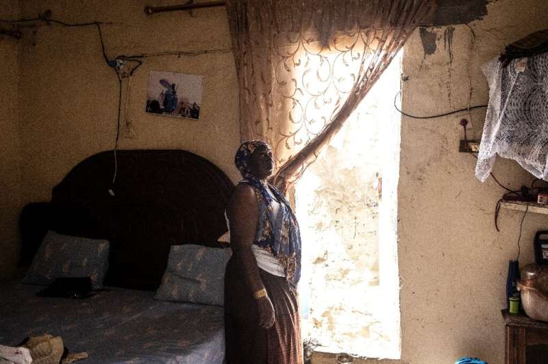 Mareme Gueye, 43, says six of the seven rooms in her house are gone, washed away by the ocean