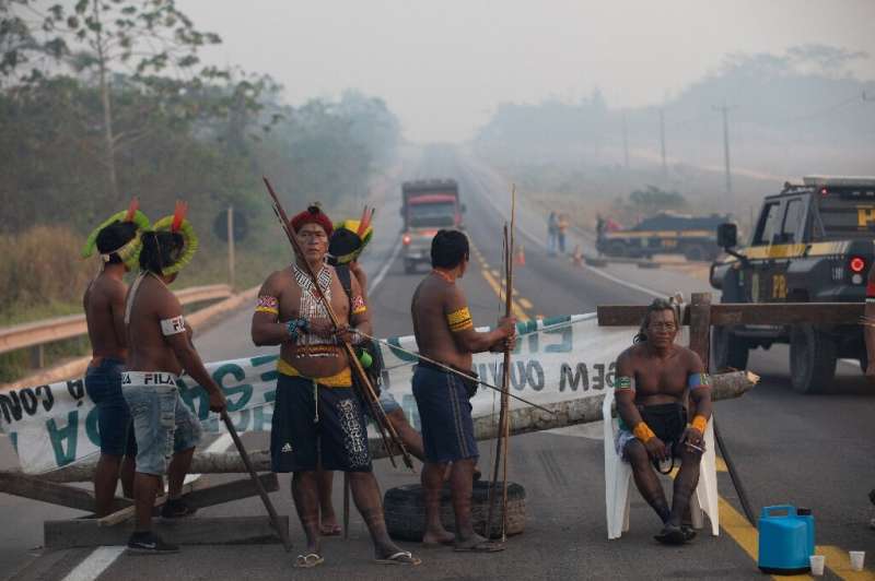 Members of the Kayapo indigenous group block highway BR163 during a protest in the outskirts of Novo Progresso in Para State, Br