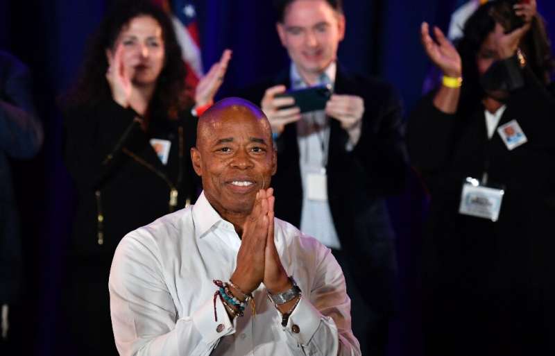 New York City Democratic Mayor-elect Eric Adams gestures to supporters during his 2021 election victory night on November 2, 202