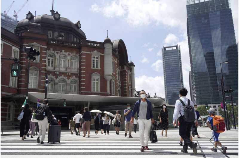 Officials in Tokyo alarmed as cases hit record highs
