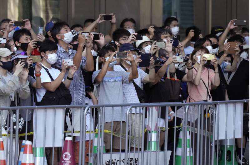 Olympics now ended, Japan races to vaccinate as virus surges