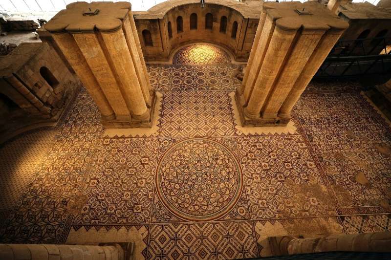 One of the largest mosaic panels in the world has been unveiled following a multi-year restoration project at Hisham's Palace in