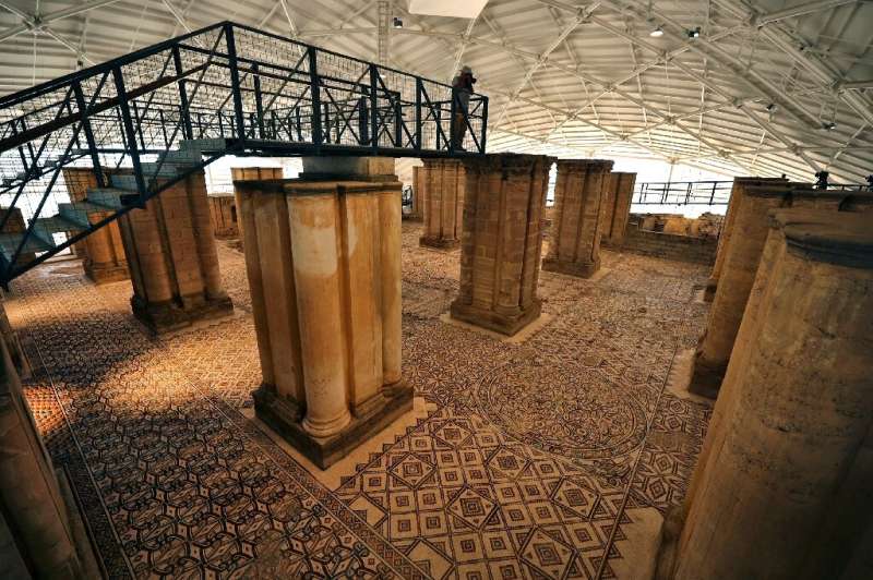 Palestinian officials say the carpet-like mosaic that covers about 836 square metres contains more than five million pieces of s
