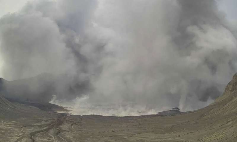 Philippine volcano belches dark plume, villagers evacuated