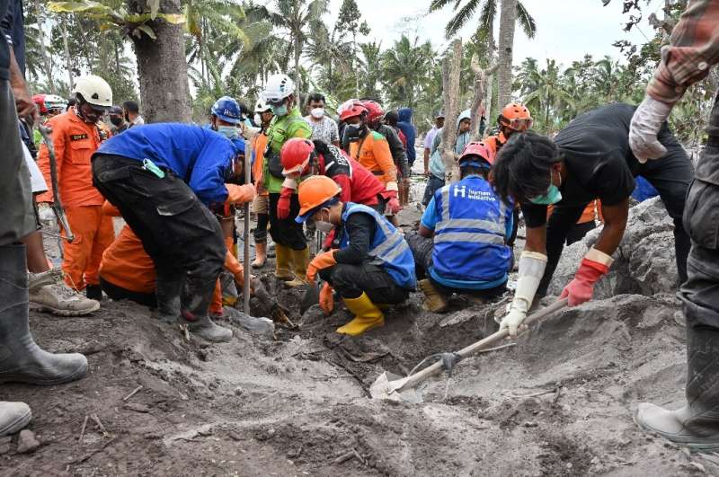 Rescuers are braving dangerous conditions as they search for survivors and bodies