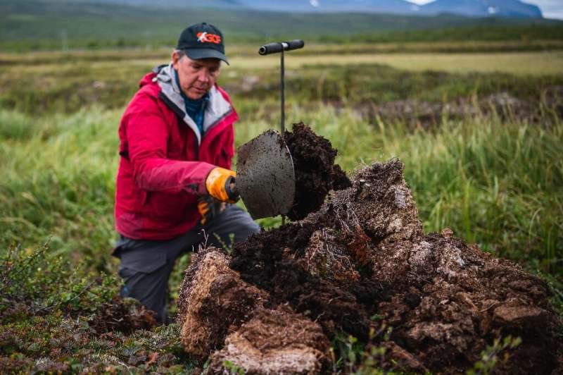 Researcher Keith Larson tracks the thawing of the permafrost which worries scientists because carbon stores, long locked in the 
