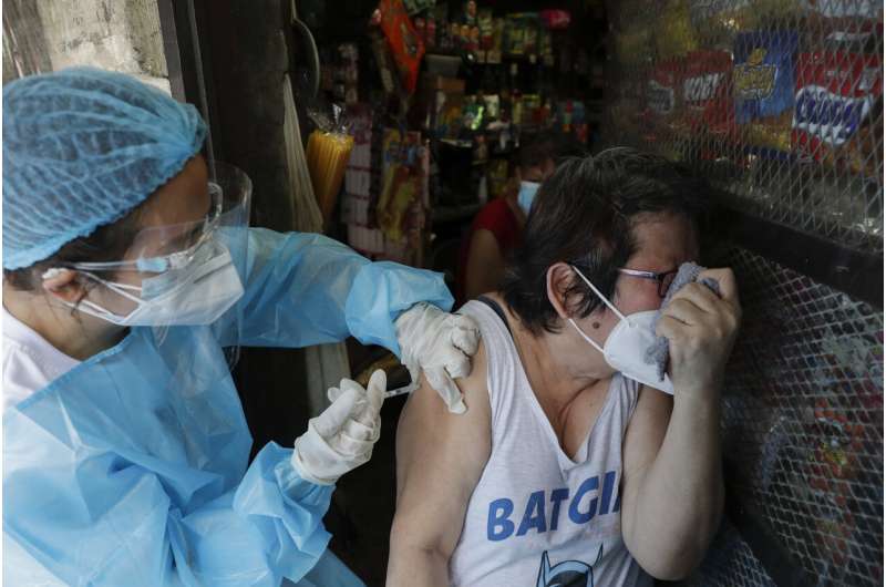 Restrictions reimposed as virus resurges in much of Asia