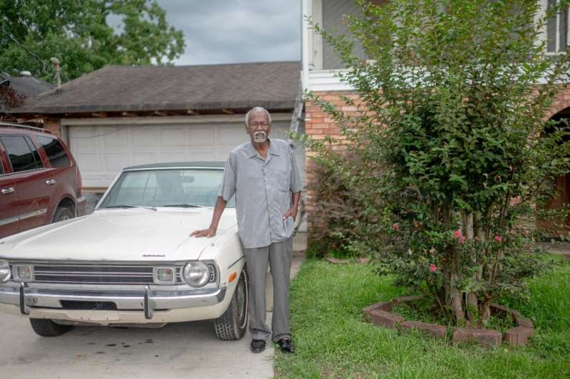Robert Taylor, seen in front of his home in Reserve, Louisiana, has seen his mother, sister, wife and nephews all suffer from ca