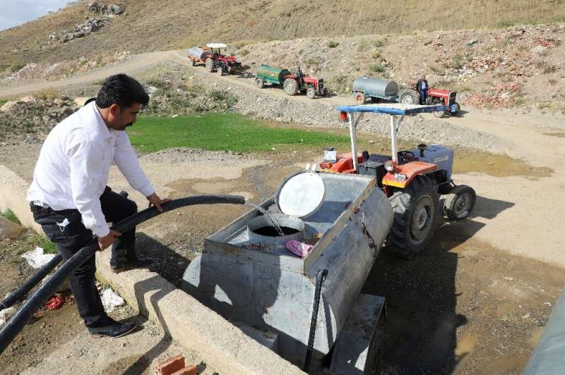 Severe droughts in Turkey have forced farmers to fill tanks with water