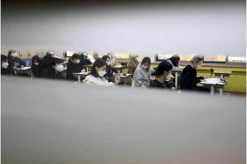 SKorea sees record virus jump as thousands take college exam