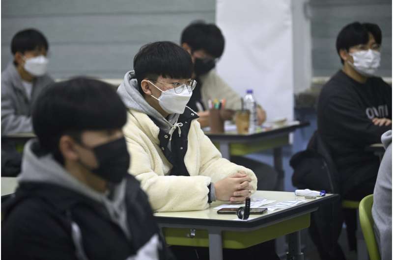 SKorea sees record virus jump as thousands take college exam