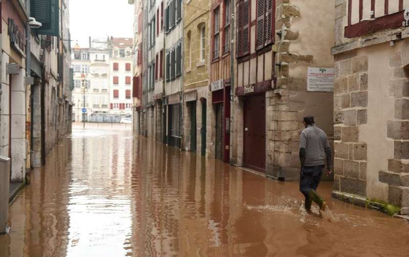 Some people were evacuated from their homes as streets flooded Friday in Bayonne, southwest France.