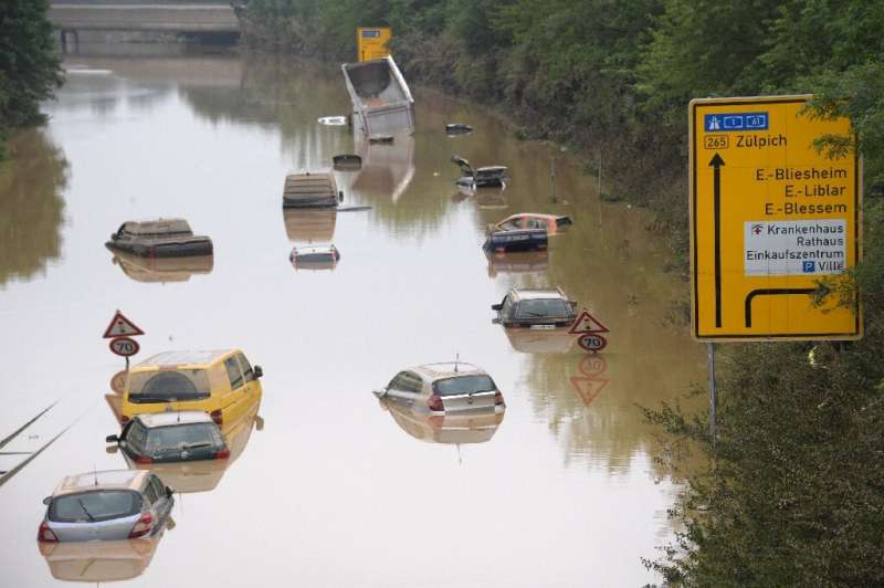 Submerged cars and other vehicles are seen on the federal highway B265 in Erftstadt, western Germany