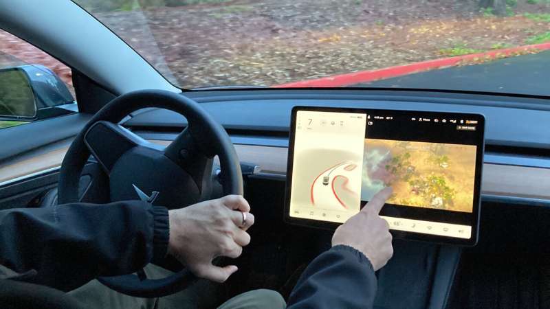 Tesla to halt games on infotainment screens in moving cars