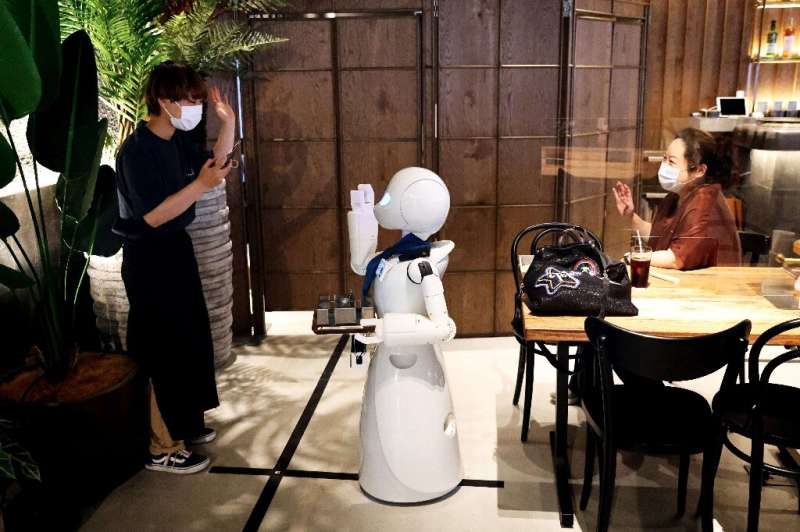 The cafe's robots are largely a medium through which workers can communicate with customers