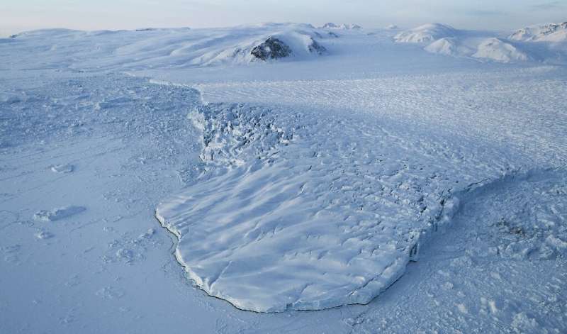 The ice sheet atop the world's largest island contains enough frozen water to lift oceans some six metres (20 feet) globally, an