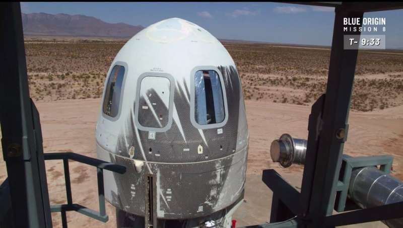 New Shepard crew capsules can be seen ready for takeoff on the eighth test flight