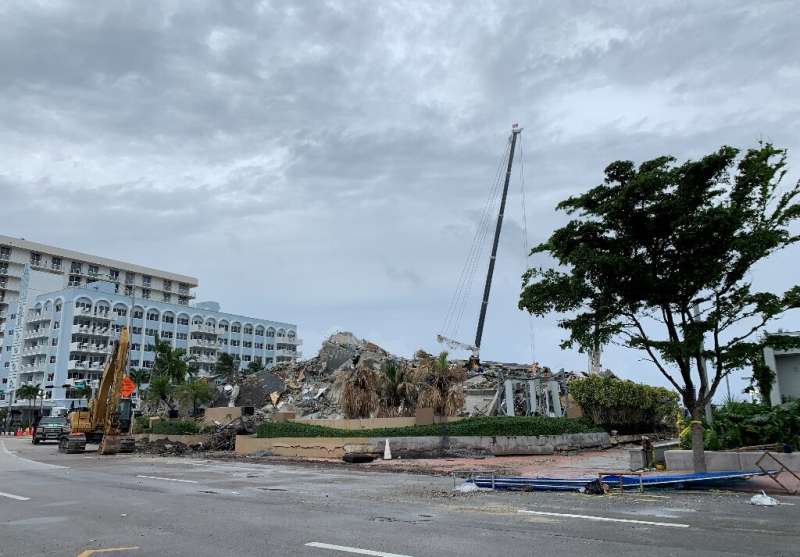 The rubble of the Champlain tower in Surfside, Florida on July 6, 2021 as rescuers race to search the collapsed condo before Tro