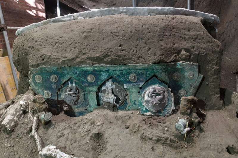 The four-wheel processional chariot was missed by looters who tunnelled by on either side
