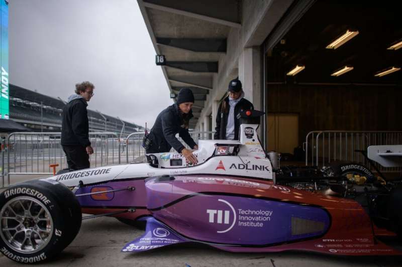 There will be cars racing Saturday at the Indianapolis Motor Speedway, but not a driver in sight