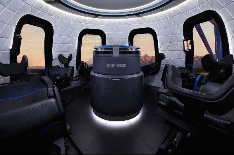 This undated handout photo obtained on July 1, 2021 courtesy of Blue Origin shows the interior of the Blue Origin crew capsule