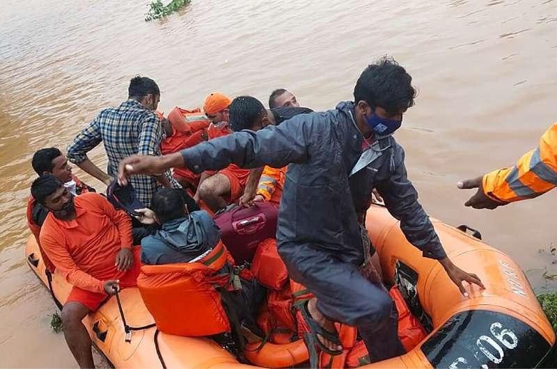 Torrential rains on India's western coast unleashed floods and landslides that killed 159 people