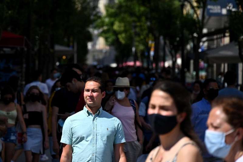 Unlike people in many other European countries who have dropped their masks, Spaniards have largely opted to hang onto them fear