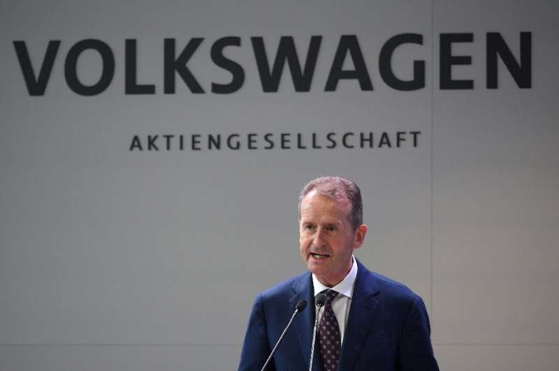 Volkswagen Group CEO Herbert Diess, pictured speaking at an event in Spain in March this year, rejected claims of planned job cu