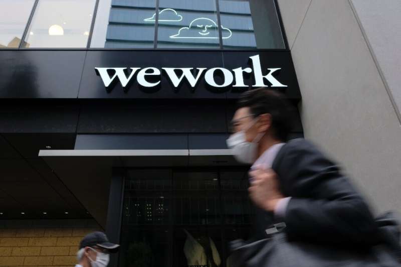 WeWork shares rose in their first session on the Nasdaq
