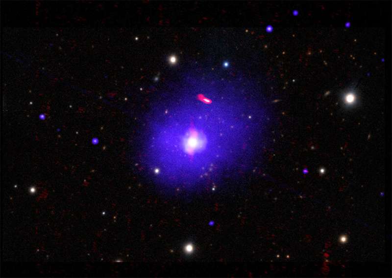 A giant black hole that spins slower than its peers