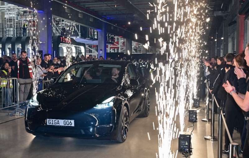 A Model Y electric vehicle drives off the production line at Tesla's &quot;Gigafactory&quot; in Berlin, Germany