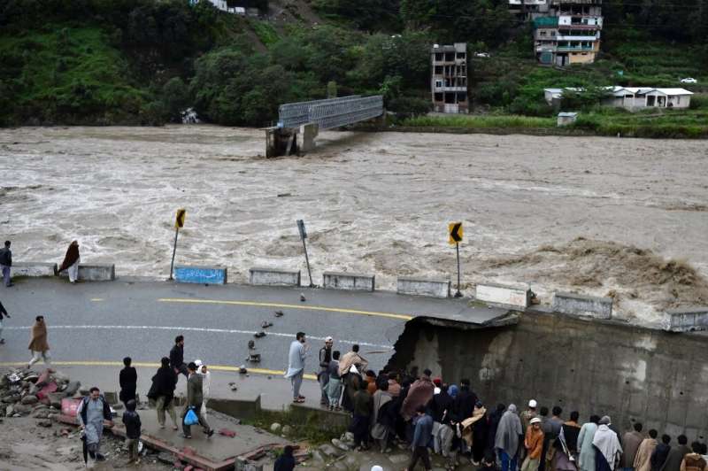 A river in Swat burst its banks and destroyed a bridge and adjoining road