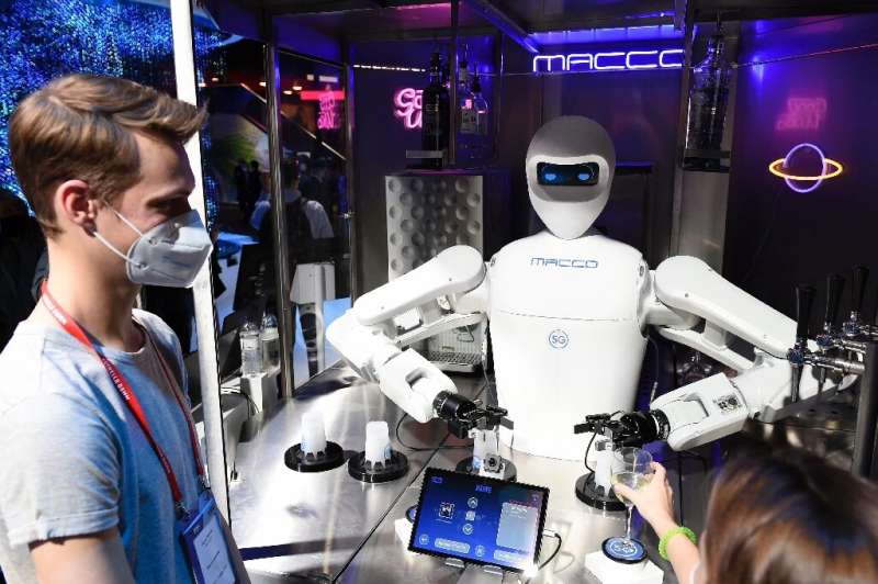 A robot bartender developed by Spanish food tech group Macco Robotics   serves drinks—but also speaks a dozen languages and reco