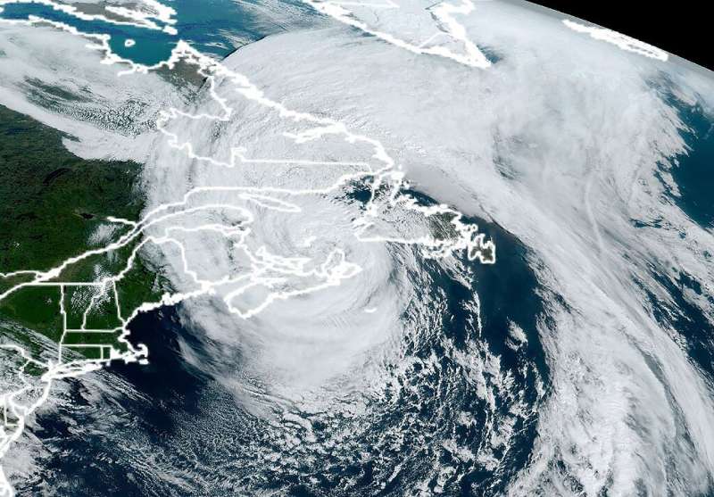 A satellite handout image shows post-tropical storm Fiona over eastern Canada at 13:50 GMT on September 24, 2022