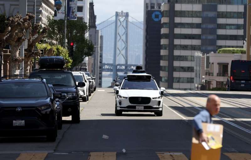 A self-driving car owned by Waymo driving in San Francisco in April 2022