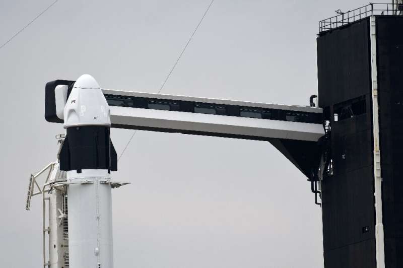 A SpaceX Dragon spacecraft is on a Falcon 9 rocket launching Pad 39A before the launch of Axiom-1.