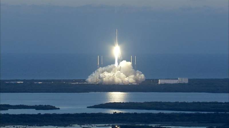 A SpaceX rocket carrying a NASA weather satellite blasts off in February 2015 from Cape Canaveral, Florida