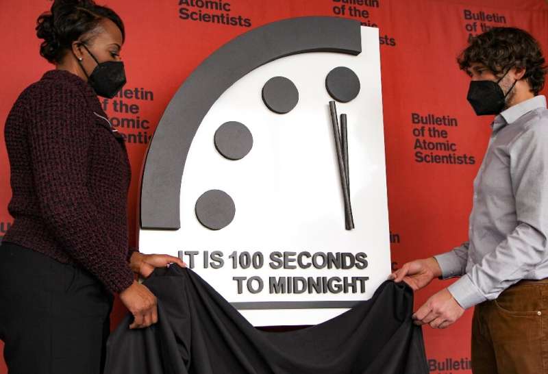 Advances including Covid-19 vaccines and risks like a rising tide of misinformation have placed the &quot;Doomsday Clock&quot; a