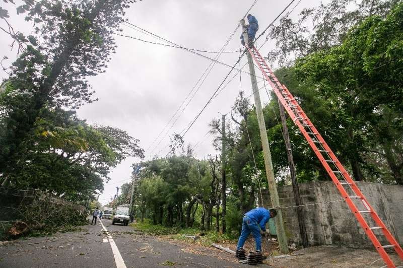 At least 7,500 homes were without power after the winds knocked down trees onto electricity lines