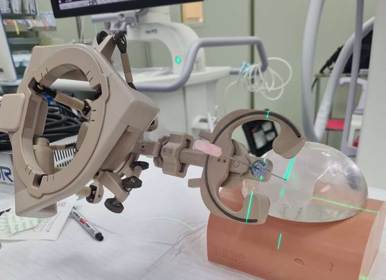 Automating renal access in kidney stone surgery using AI-enabled surgical robot