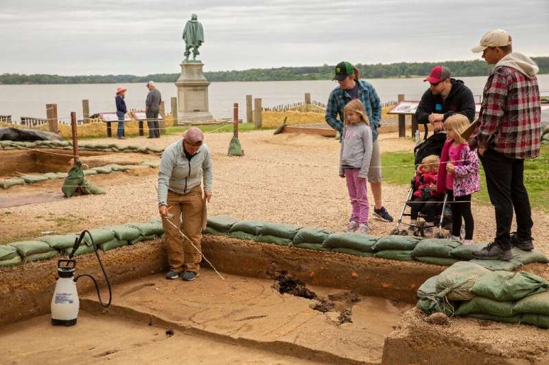 Caitlin Delmas, staff archaeologist, discusses her work with visitors in Jamestown, Virginia on May 10, 2022