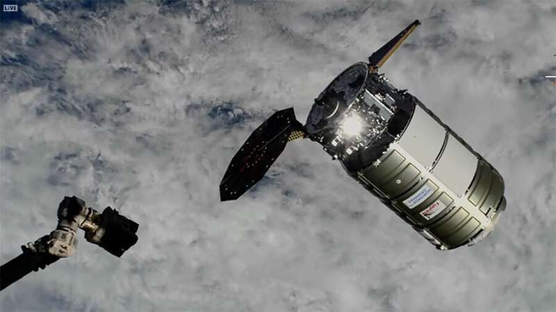 Cargo ship reaches space station despite jammed solar panel