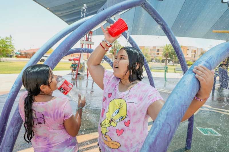 Children beat the heat at at a water park in Imperial California, where temperatures reached 115 degrees on June 12, 2022