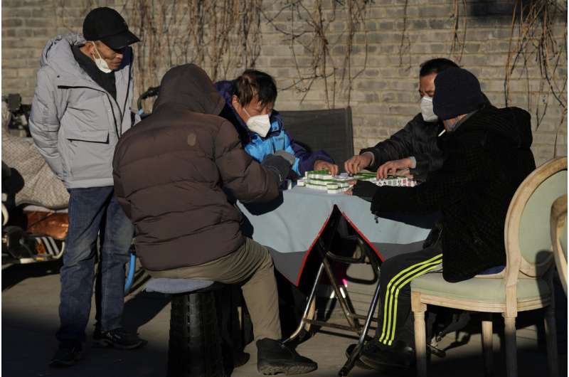 China faces bumpy road to normal as infections surge