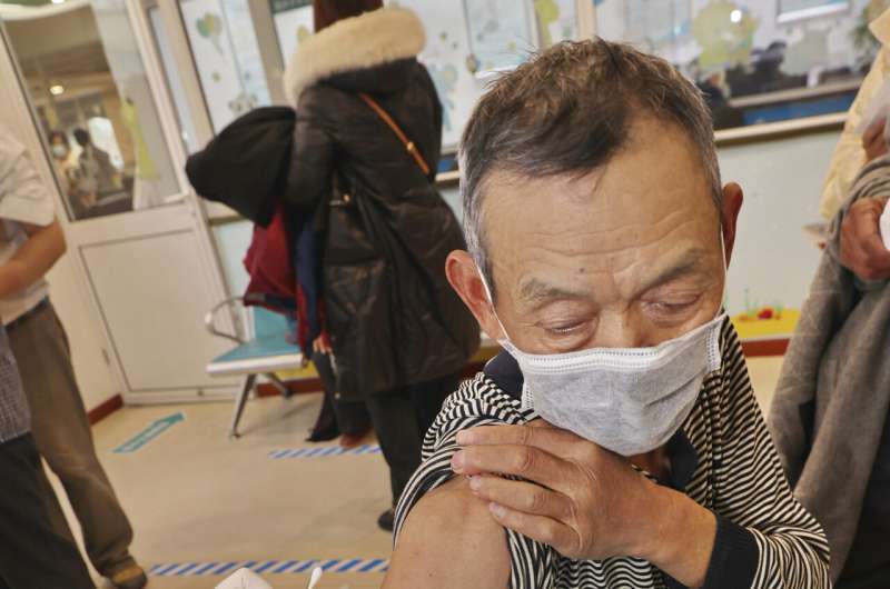 China races to vaccinate elderly, but many are reluctant