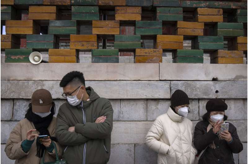 China tightens restrictions as rise in virus cases reported